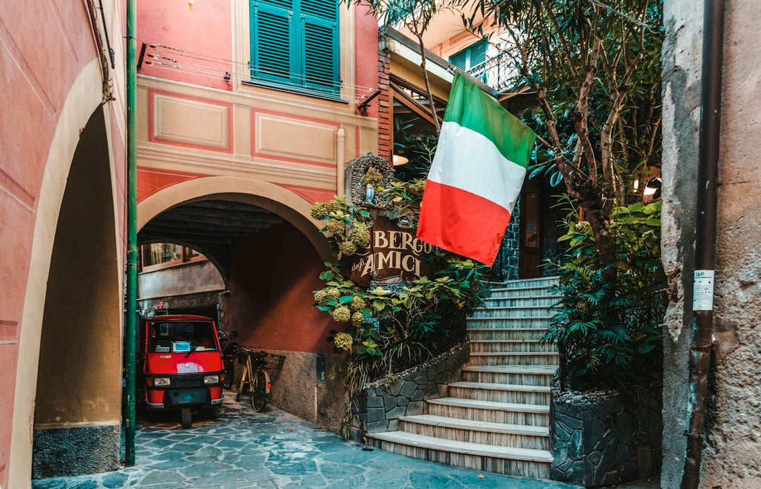 red auto-rickshaw under arch walkway